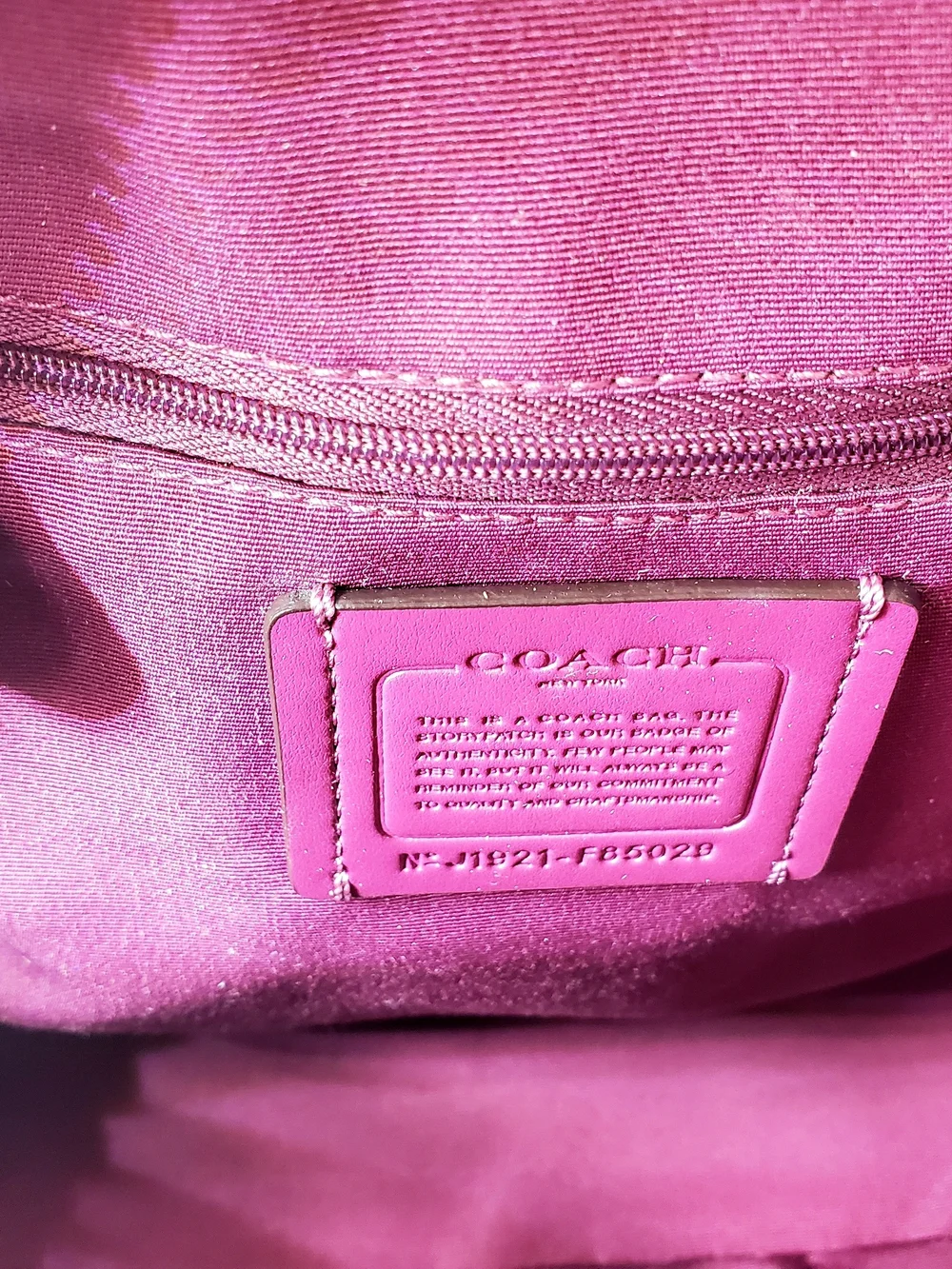 COACH JORDYN BACKPACK IN SIGNATURE CANVAS METALLIC BERRY/BROWN